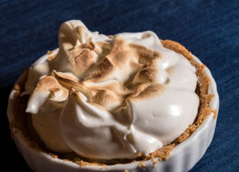 Close macro shot of the crisped top of a home made gluten free lemon meringue pie