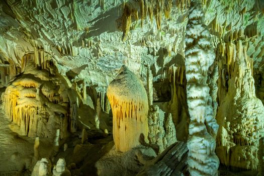 Stalactites and stalagmites underground in cave system in Postojna