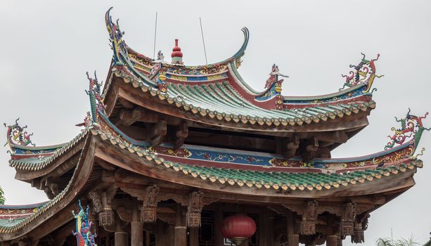 Detail of roof carvings on South Putuo or Nanputuo Temple