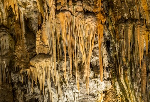 Stalactites and stalagmites underground in cave system in Postojna