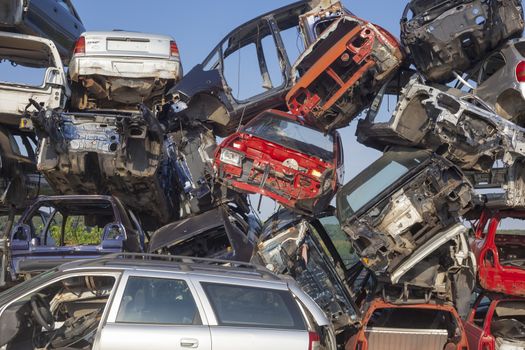 Old scrap cars on junkyard are waiting for recycling 