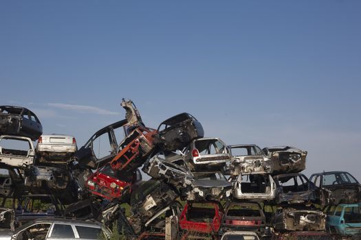 Old cars on junkyard are waiting for recycling proces