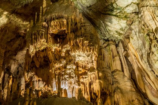 Stalactites and stalagmites underground in cave system in Postojna