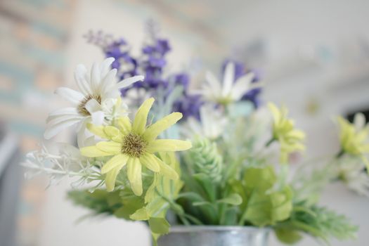 Close up white and green flowers with pollen. Blooming of fake flower and leaf. Select focus shallow depth of field and blurred background.