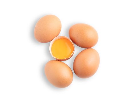 Top view, broken raw egg isolated on the white background with clipping paths