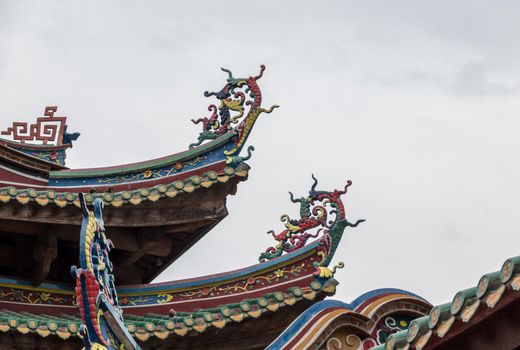 Detail of roof carvings on South Putuo or Nanputuo Temple