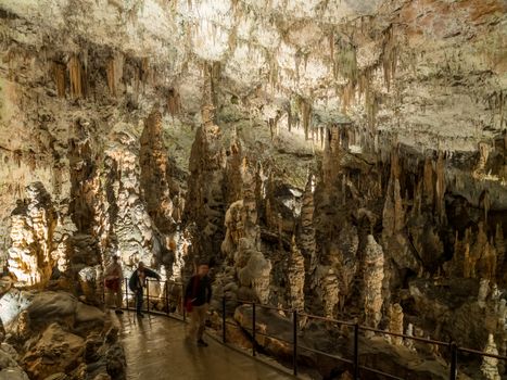Stalactites and stalagmites underground in cave system in Postojna
