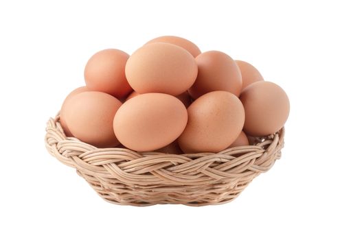 Raw eggs in the wicker basket isolated on the white backgrounds with clipping paths