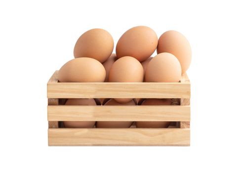 Eggs in the wooden basket isolated on the white background with clipping paths