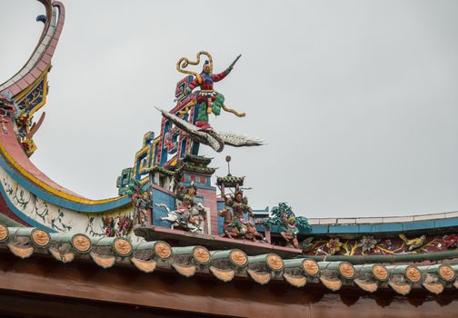 Detail of roof carvings on South Putuo or Nanputuo Temple
