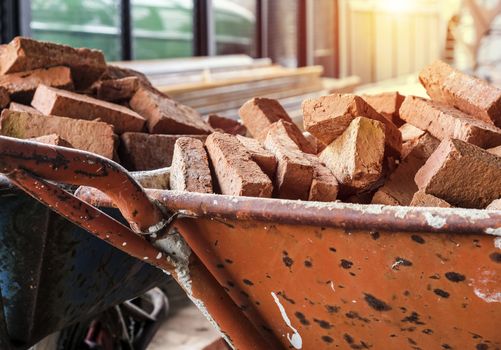 Bricks on metal car in construction site