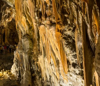 Stalactites and stalagmites underground in cave system in Postojna