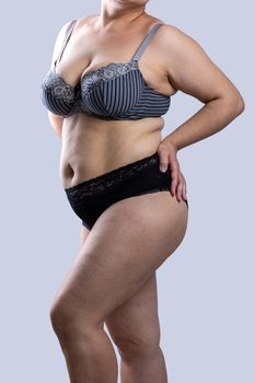 Woman Real Body Plus size Model in lingerie posign, imperfect nonideal