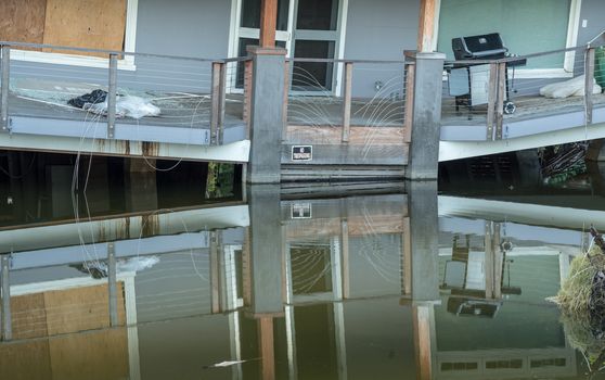 Balcony of beach home sinking into sink hole after the massive rain storms of April 2018 on Kauai