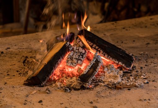 Wood fire and embers used for smoking food or home made bakery oven