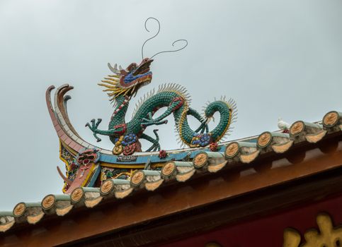 Detail of roof carvings on South Putuo or Nanputuo Temple
