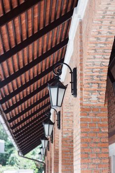 Metal lighting lamp on the wall, stock photo