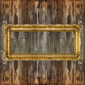 Big Old Picture Frame on wooden baclground