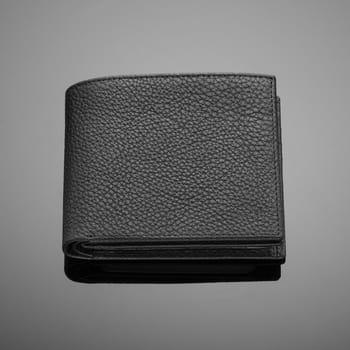 Fashionable designer leather men's wallet on a black background