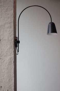 Metal lighting lamp on the wall, stock photo