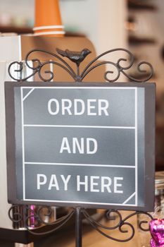 Order and pay here  sign, stock photo