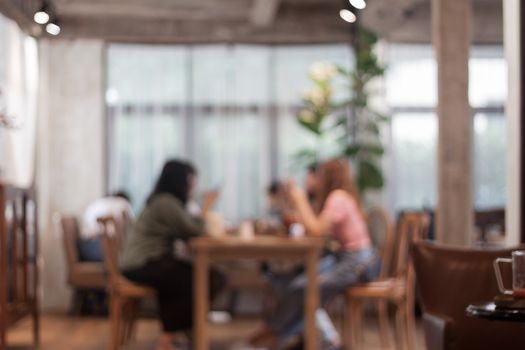 Blurred background of people in cafe, stock photo