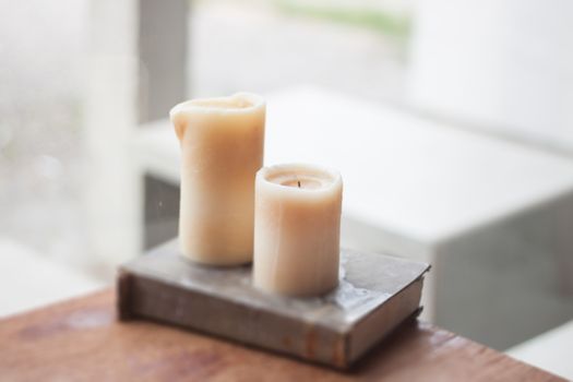 Two candles decorated in coffee shop, stock photo