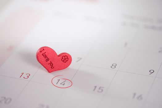 Calendar page with the red hearts on February 14 of Saint Valentines day, AF point selection.