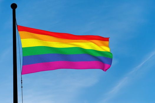 Gay Rainbow Flag waving over blue sky (3D rendering)