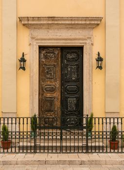 Solid wooden entrance doors to Kyra-Panagia Faneromeni or Virgin of Strangers church
