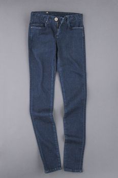 fashionable denim pants on grey background, top view