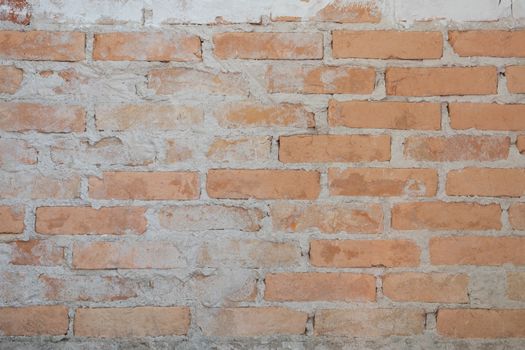 Old brick wall in antiquity and was damaged by the time until the mortar fell. - Image