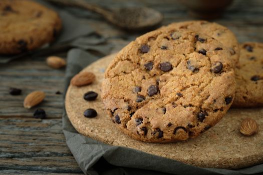 Chocolate chip cookies stacked up on a plate in low light, 
AF point selection