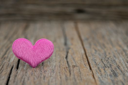 Image-One Heart on wooden background. Copy space Valentines day concept.