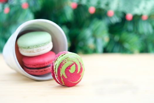 Sweet and colorful macaroons cookies on wooden background with blank space,selective focus, Dessert.