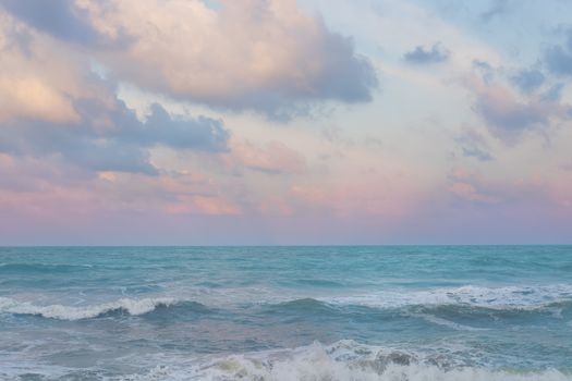 Beautiful pastel sunset sky with cloudscape over the Songkhla ocean.