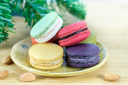 Sweet and colorful macaroons cookies on wooden background with blank space,selective focus, Dessert.