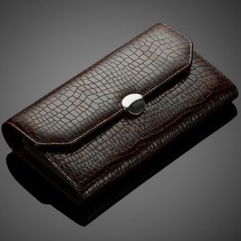 Fashionable leather men's wallet on a dark background