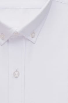 white shirt, detailed close-up collar and button, top view