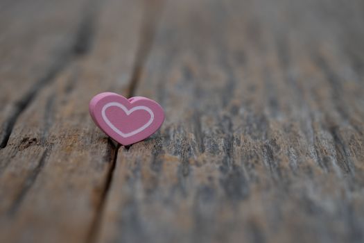 Image-One Heart on wooden background. Copy space Valentines day concept.