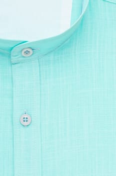 green shirt, detailed close-up collar and button, top view