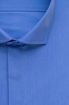 blue shirt, detailed close-up collar and button, top view