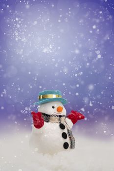 A snowman  on bokeh with copy space for season greeting Merry Christmas, AF point selection,