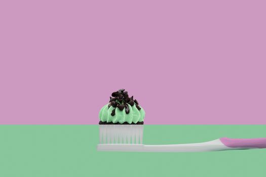 Toothbrush with cupcakes on two colors Pink and green, minimal style.