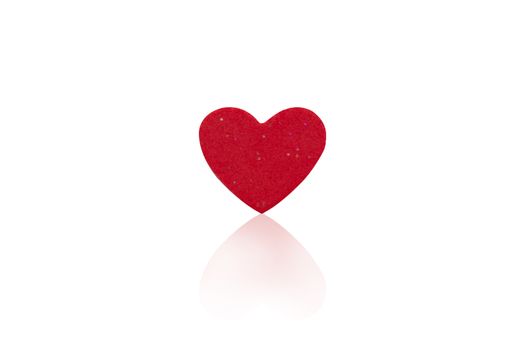 Red heart isolated on white background.