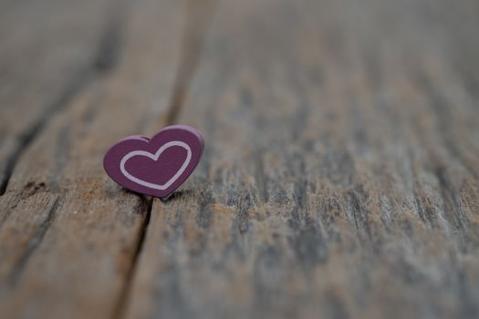 Image-One Heart on wooden background. Copy space Valentines day concept.