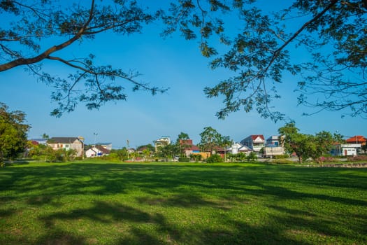 The beautiful summer landscape with a home and green garden with copy space.