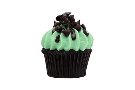 Green cupcake isolated on white background.