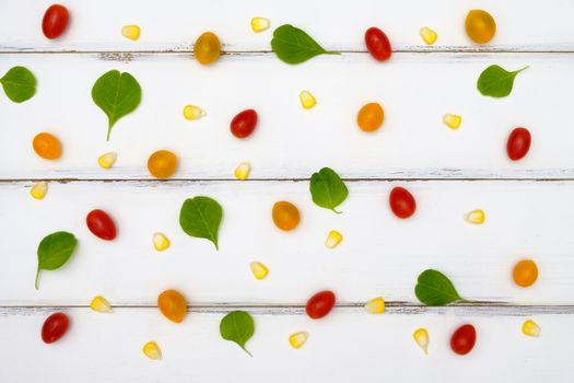 Many vegetables are placed on a white table health idea and concept.