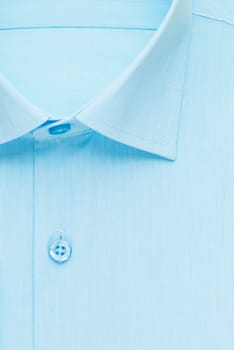 blue shirt, detailed close-up collar and button, top view